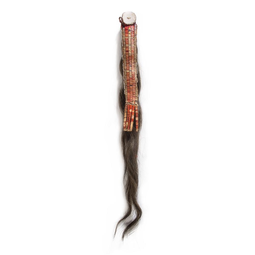 Plains Beaded and Quilled Hide Hair Ornament, From the: Plains Beaded and Quilled Hide Hair Ornament, From the Collection of Robert Jerich, Illinois sinew-sewn on hide decorated with quills with white beads along the edge; accented with cow tail and a carv