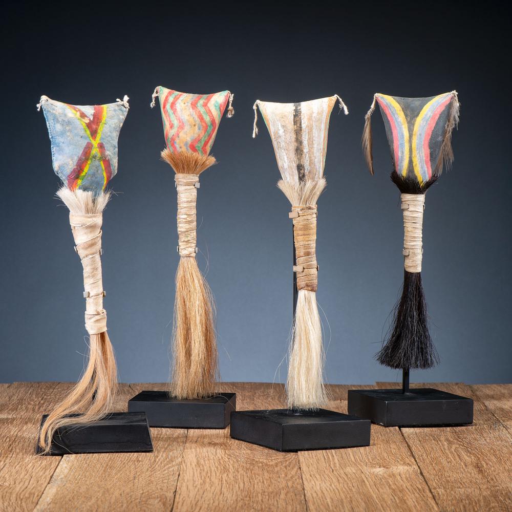 Navajo Polychrome Rattles, From the Collection of Dick: Navajo Polychrome Rattles, From the Collection of Dick Jemison, Alabama lot of four painted rattles with handles wrapped with horsehair and hide thongs; tallest height 14.5 in. ca 1930 Provenance: Fro