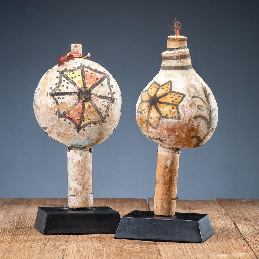 Wilson Tawaquaptewa (Hopi, 1871-1960) Attributed: Wilson Tawaquaptewa (Hopi, 1871-1960) Attributed Polychrome Gourd Rattles, From the Collection of Dick Jemison, Alabama lot of two rattles, both painted with floral designs and one featuring a butter