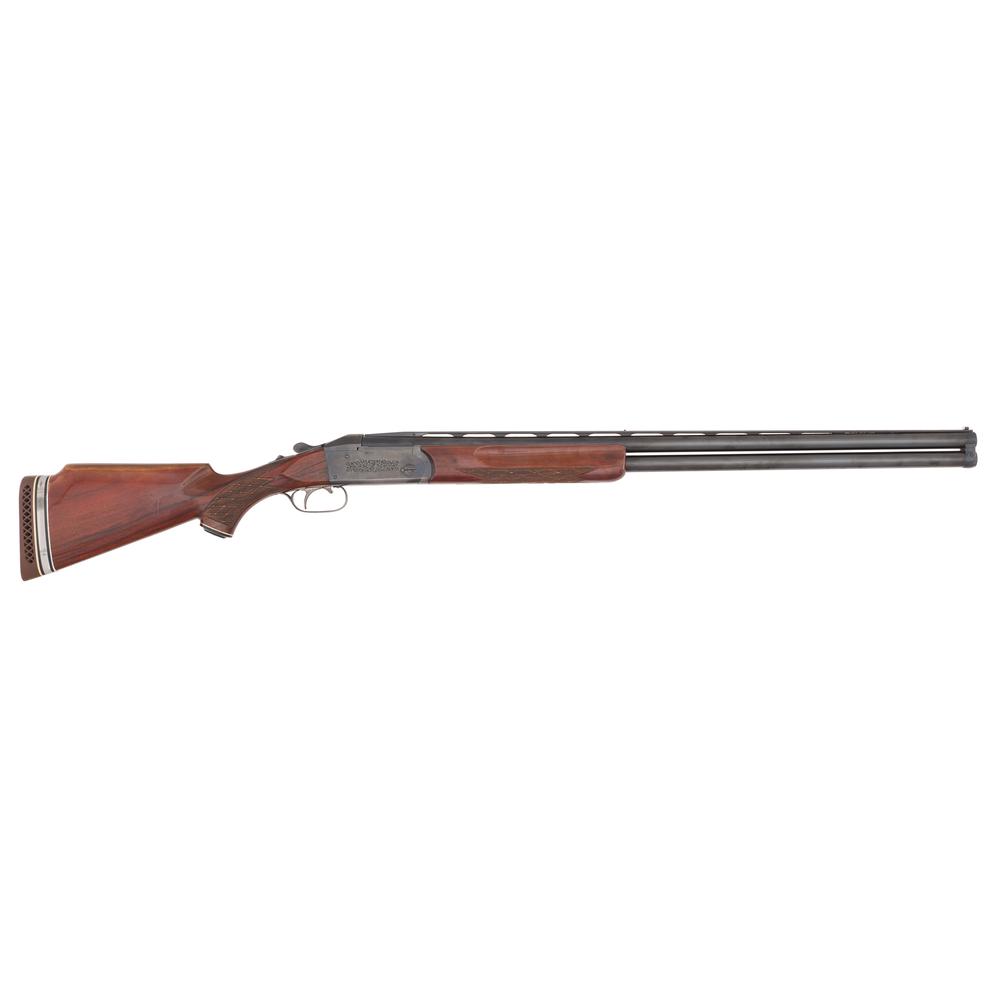 ** Cased Krieghoff Model 32 Over-Under Shotgun: 12 gauge, 29.75" barrel, S/N 6841. Length of pull 14.25", drop at heel 1.75". 2.75" chambers, full/improved modified chokes. Blued finish with checkered forend and grip. Bead front sight with 
