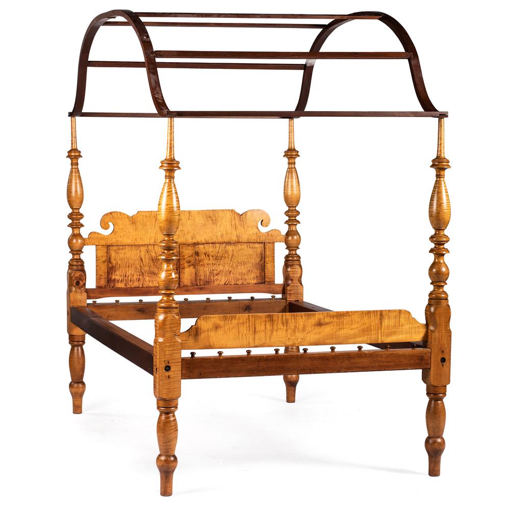 A Federal Carved, Turned and Figured Maple Four-Post: A Federal Carved, Turned and Figured Maple Four-Post Tester Bed 19th Century Height 86 x width 54 x depth 83 inches.