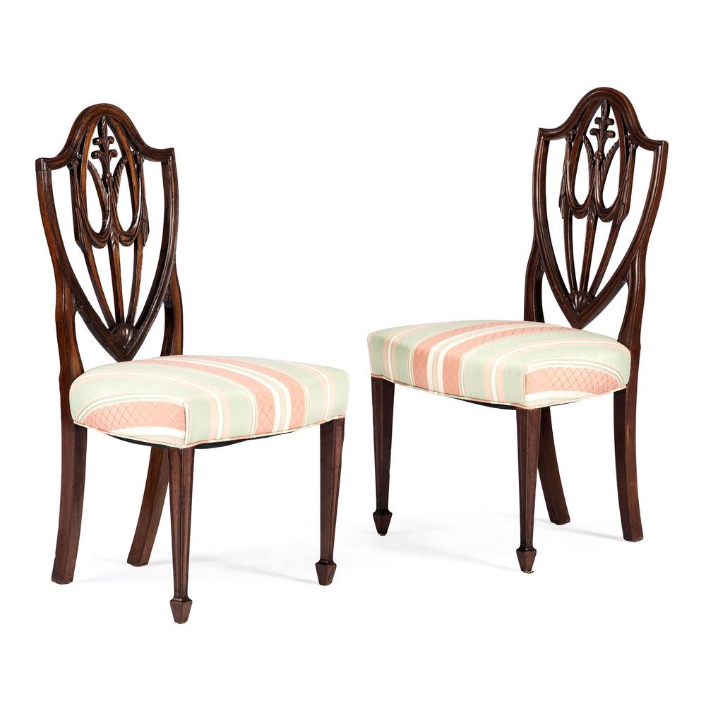 A Pair of New York Hepplewhite Mahogany Side Chairs: Circa 1800 Height 39 1/2 x width 21 x depth 20 inches. Provenance: Israel Sack, Inc.