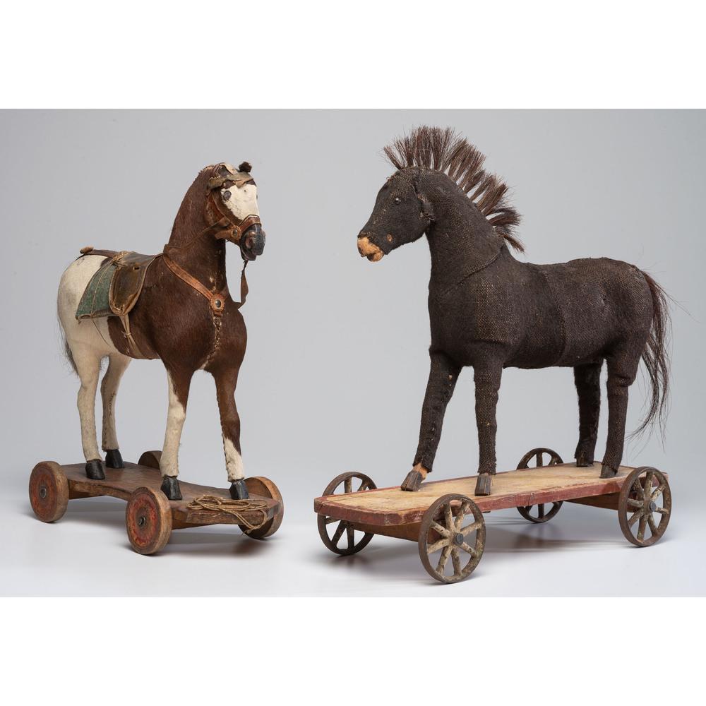 Two Hide-Covered Horse Pull Toys: <19th Century Height of larger 20 x length 17 inches. Provenance: Property from the Estate of Joan Conway Crancer, St. Louis, Missouri