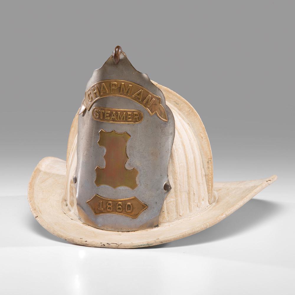 A Chapman-Steamer Leather Eagle Fireman's Helmet: New York, Circa 1860 helmet made by the John Olson Co. Height 9 1/4 x length 14 1/2 inches.
