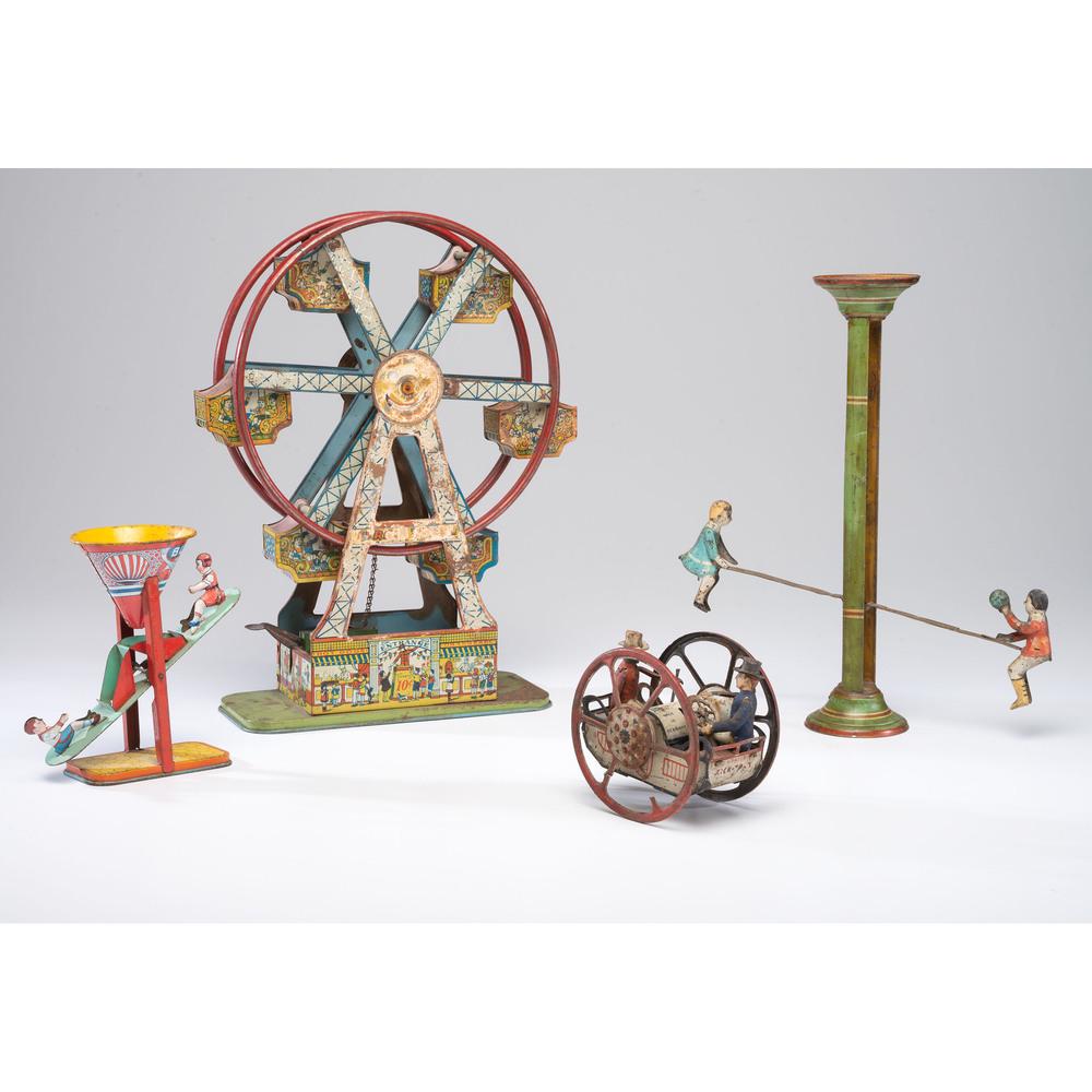 Four Painted and Lithographed Tin Toys: Early 20th Century including a Lehmann Zick Zack wind-up, a Chien Busy Mike sand toy and Nifty Ferris wheel, and a teeter totter. Height of tallest 16 inches. Provenance: Property from the Estate of J
