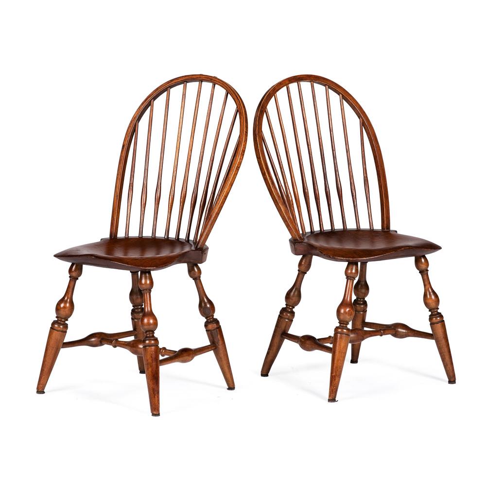 A Pair of Mixed Wood Sackback Windsor Chairs: 18th Century Height 37 x width 16 x depth 18 inches.