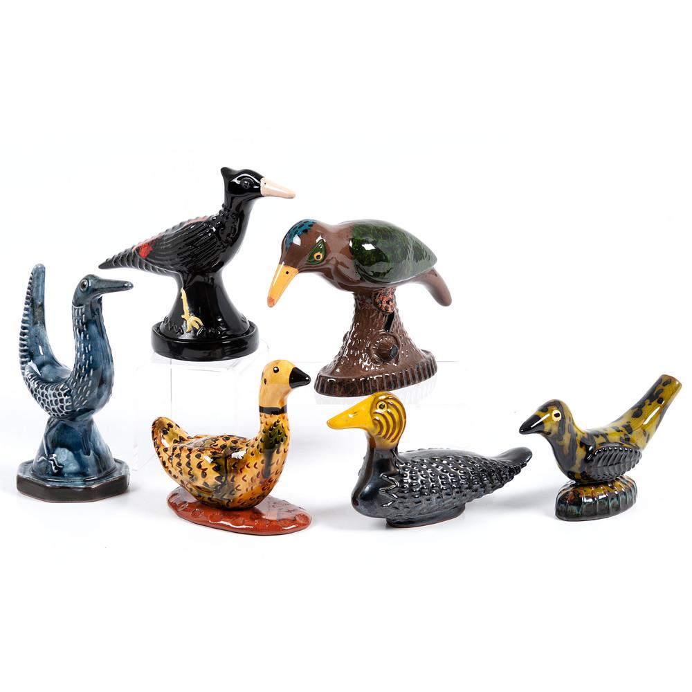 A Group of Glazed and Molded Redware Bird Figures by: A Group of Glazed and Molded Redware Bird Figures by James Seagreaves (American, 1913-1997) 20th Century six total, each initialed JCS. Height of largest 5 x length 6 1/2 inches. Provenance: Property