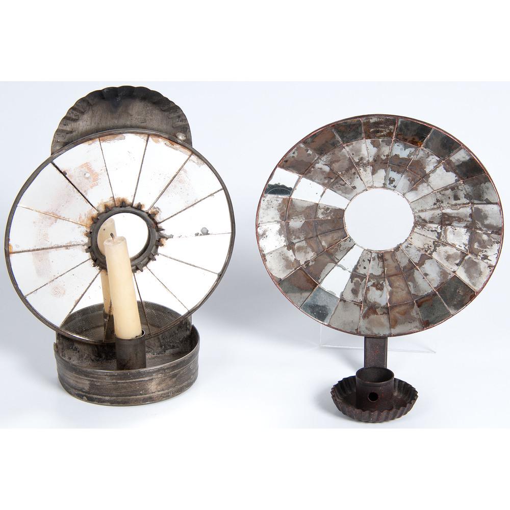 Two Mirrored Tin Sconces: 19th Century Height of larger 10 1/4 inches. Provenance: Property from the Collection of Judith & Gary Gay, Morrow, Ohio