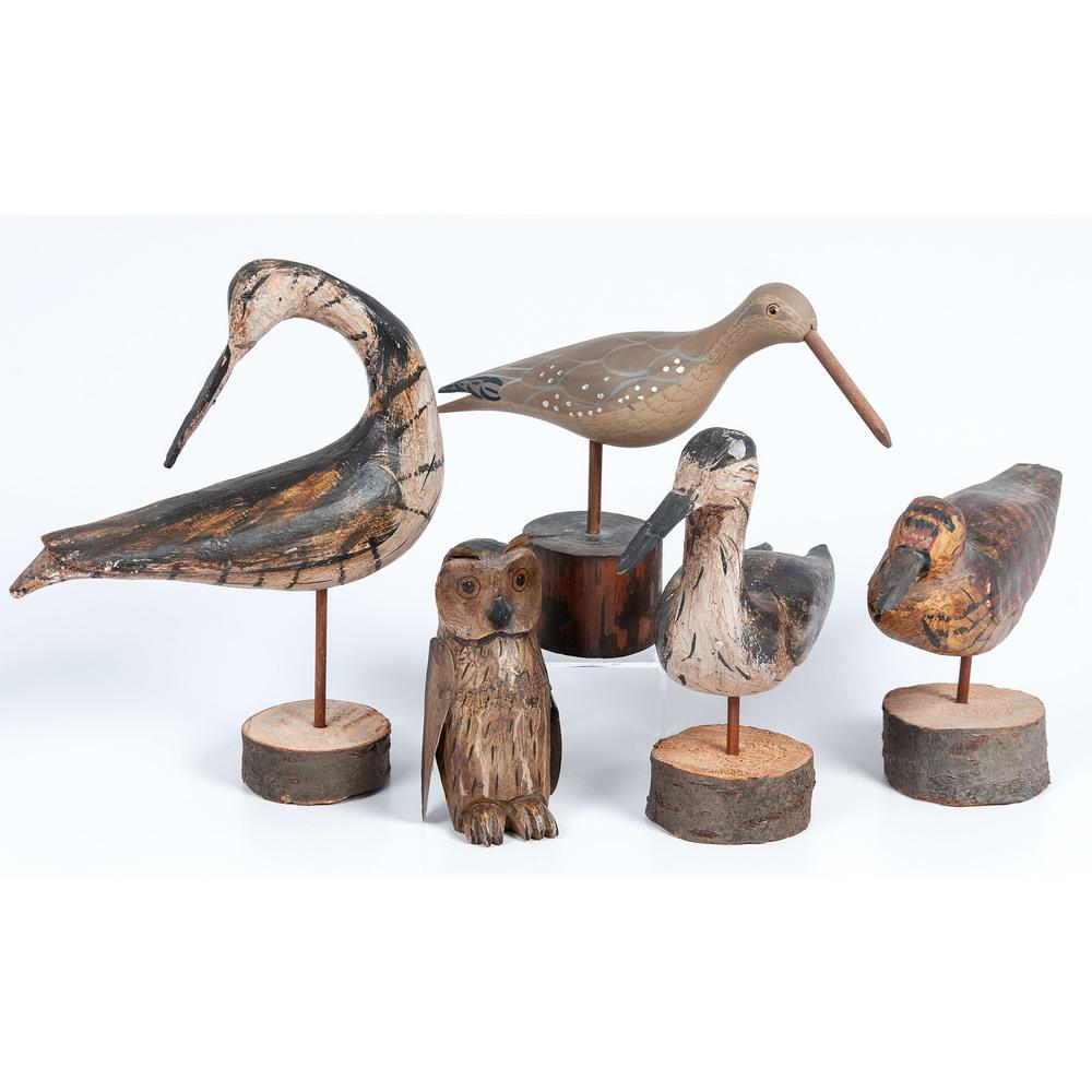 Five Carved Decorative Decoys: American, 20th Century includes four birds and one owl. Length of largest 11 inches. Provenance: Property from the Collection of Judith & Gary Gay, Morrow, Ohio
