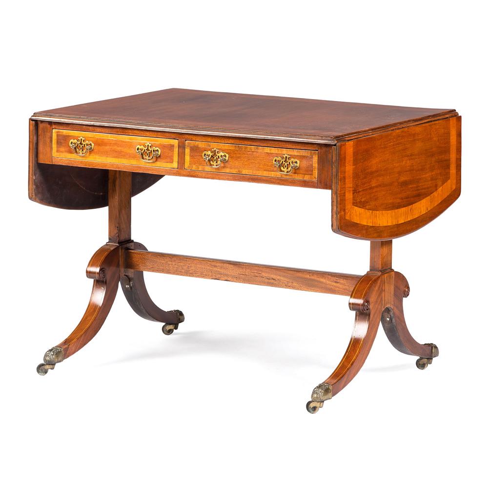 An English Regency Mahogany Drop Leaf Writing Table: 19th Century Height 28 x width 36 x depth 30 inches (leaves closed).
