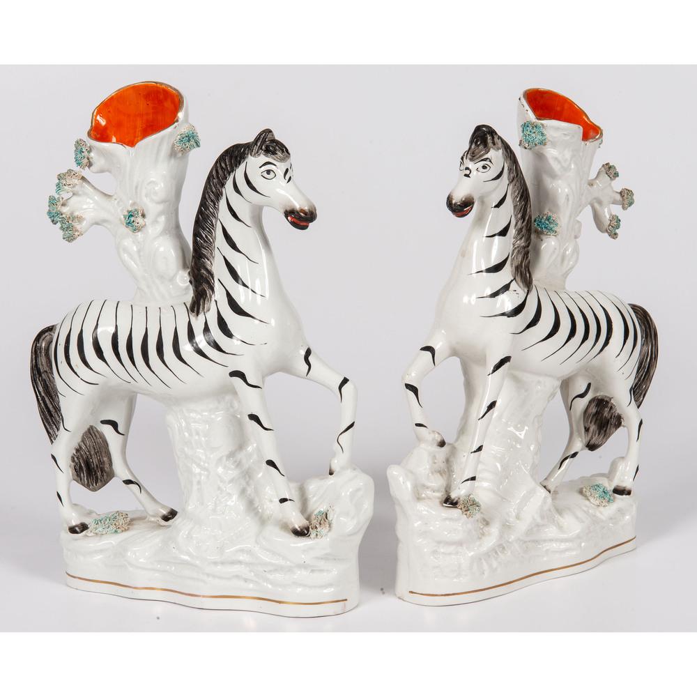 A Pair of Staffordshire Zebra Spill Vases: English, 19th Century unmarked. Height 11 1/4 x 8 1/2 inches. Provenance: Purchased Zane Moss Antiques LTD. New York, New York