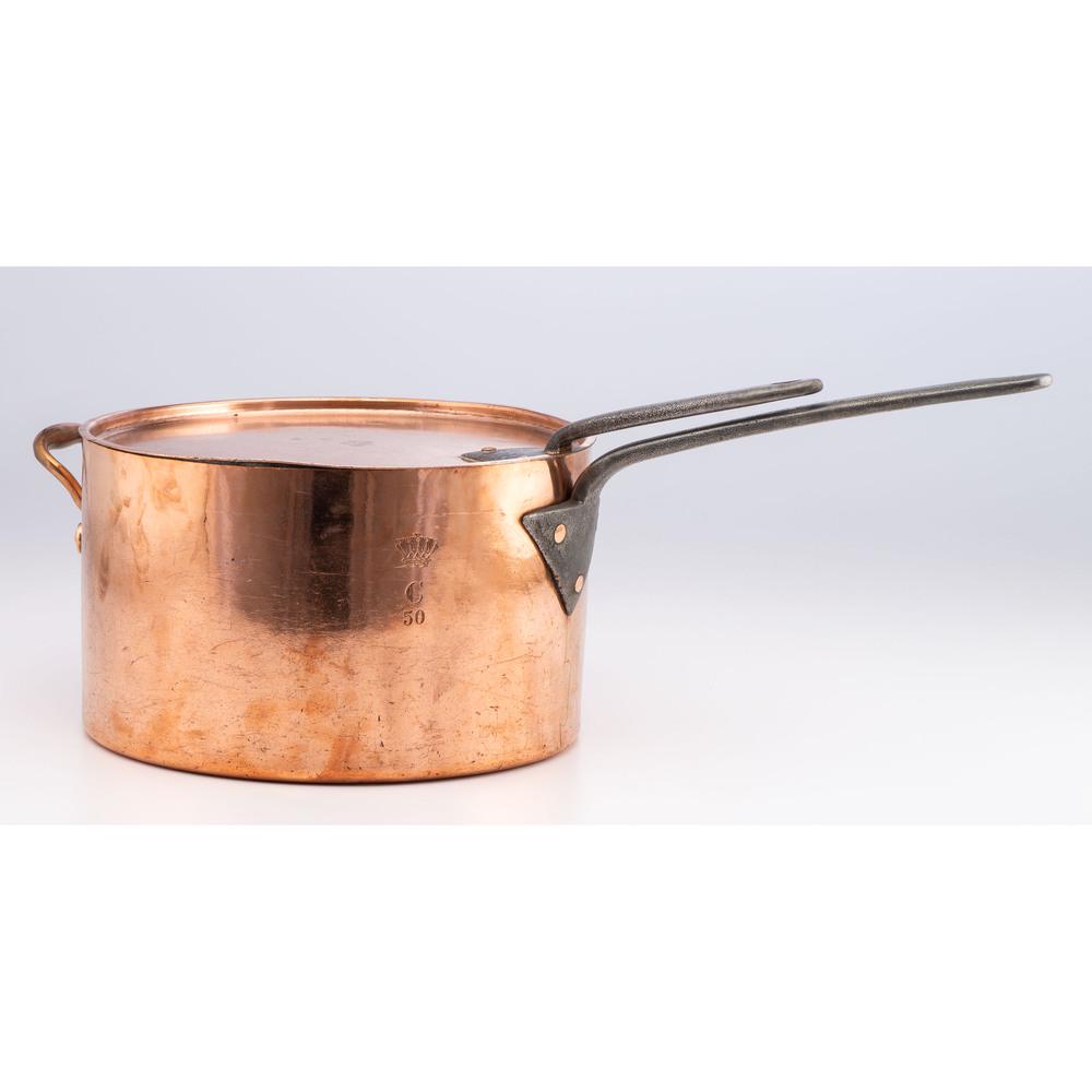A Large English Lidded Copper Saucer Pan with Crown: A Large English Lidded Copper Saucer Pan with Crown Engraving 19th Century dovetailed, both pan and lid are stamped with a crown, capital C, and 50. Height 8 1/2 x diameter 14 inches. Provenance: Prop