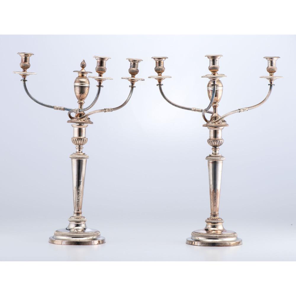 A Pair of Three-Light Sheffield Plate Candelabra: 19th Century unmarked, with engraved eagle on base of each. Height 25 1/4 inches. Provenance: Property of a Midwestern Museum