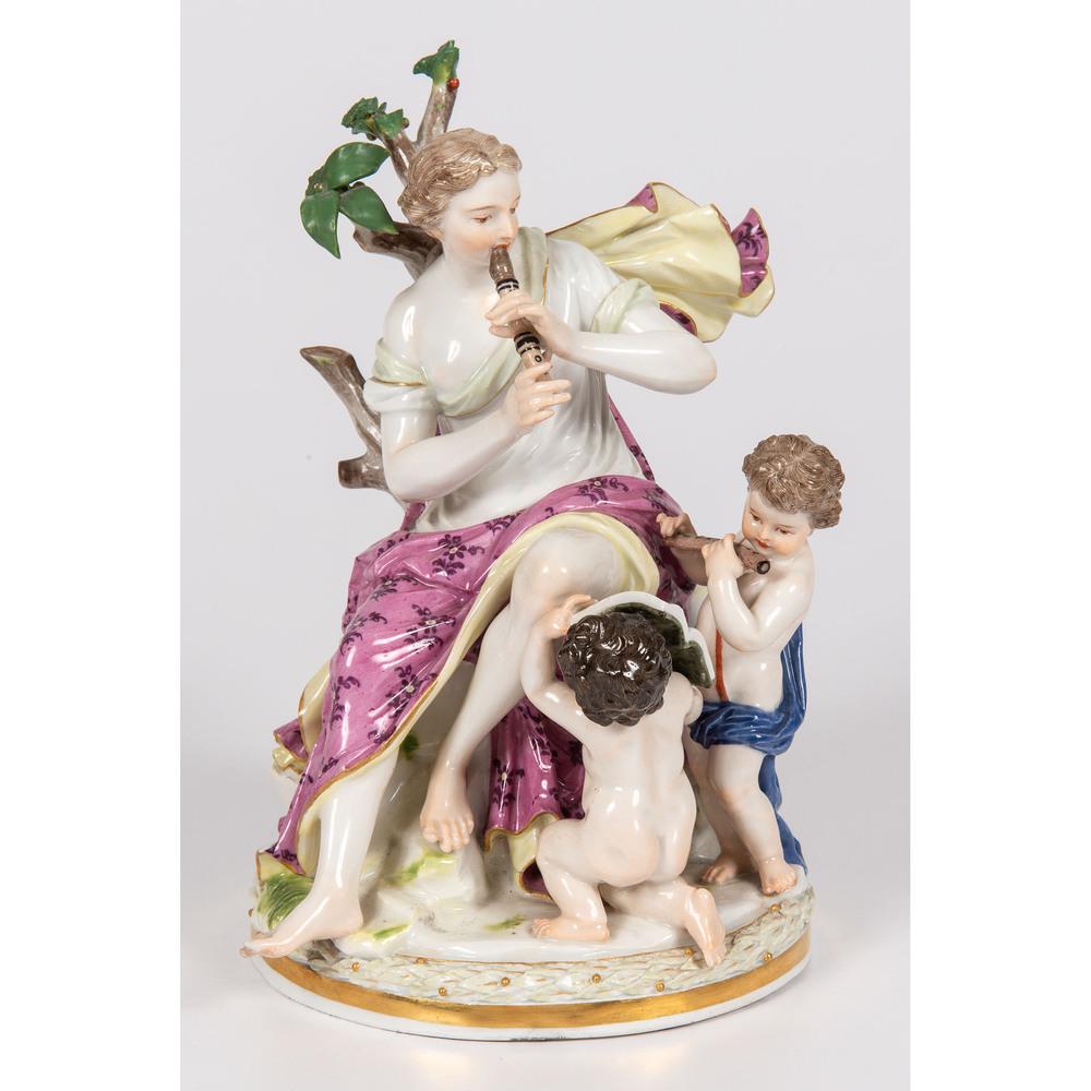 A Meissen Porcelain Figural Group: 19th/Early 20th Century with blue underglaze mark, incised 615, and stamp 132. Height 7 5/8 inches.