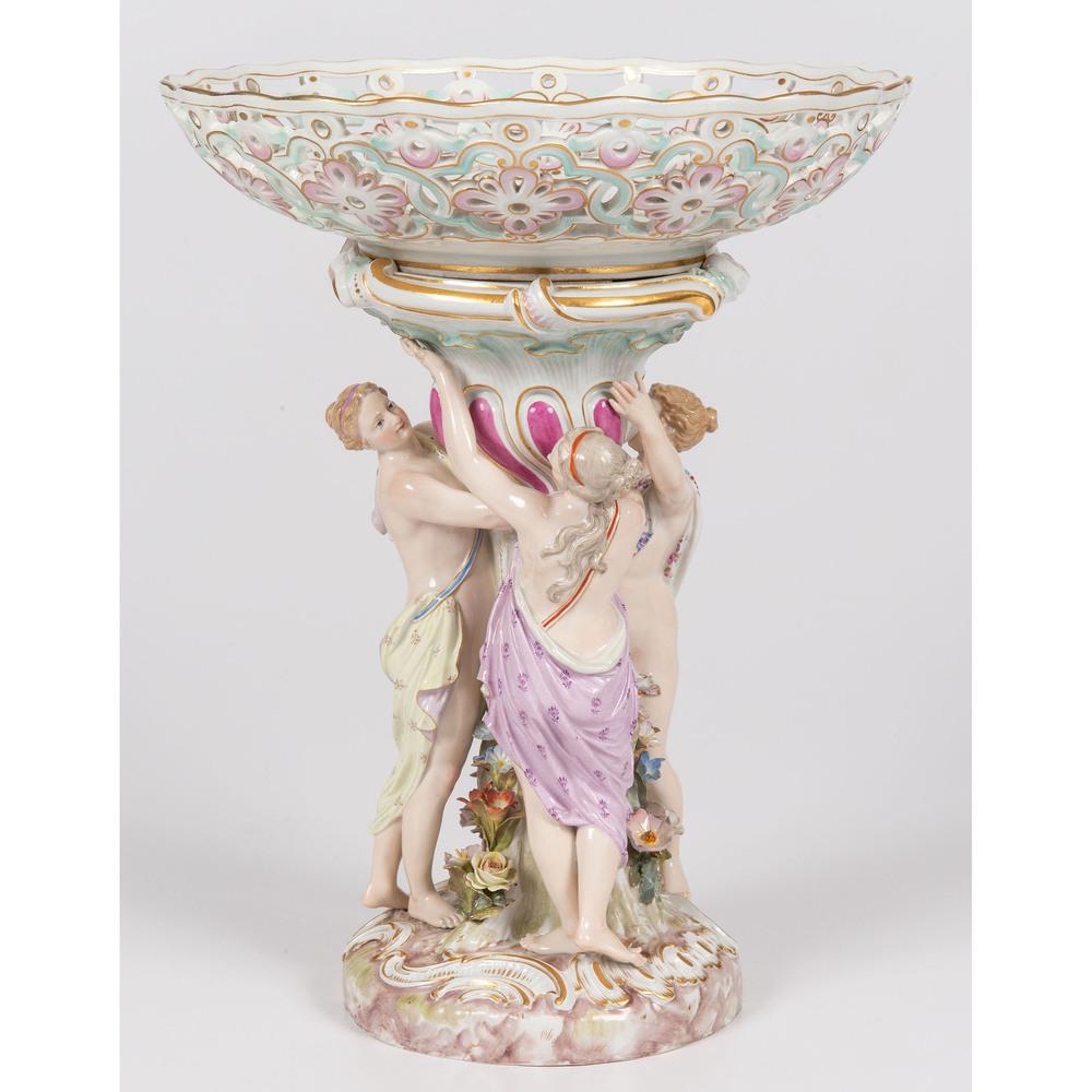 A Meissen Porcelain Figural Centerpiece: 19th/Early 20th Century with blue underglaze mark, incised 2685, and stamp 29. Height 12 1/4 inches.