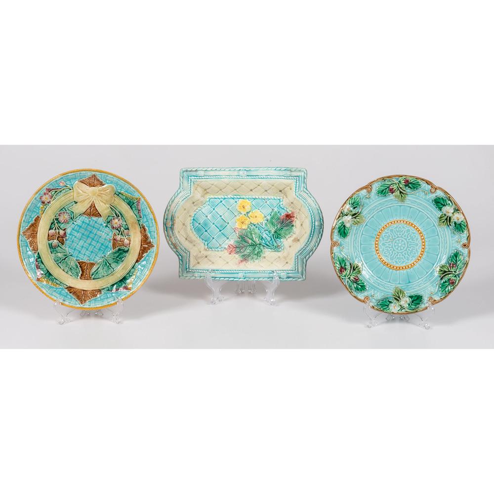 Three Majolica Plates: English and Continental, 19th Century includes two plates and one serving dish, each with raised floral and leaf decorations. one marked for Sarreguemines. Length of serving dish 10 x width 7 inches. 
