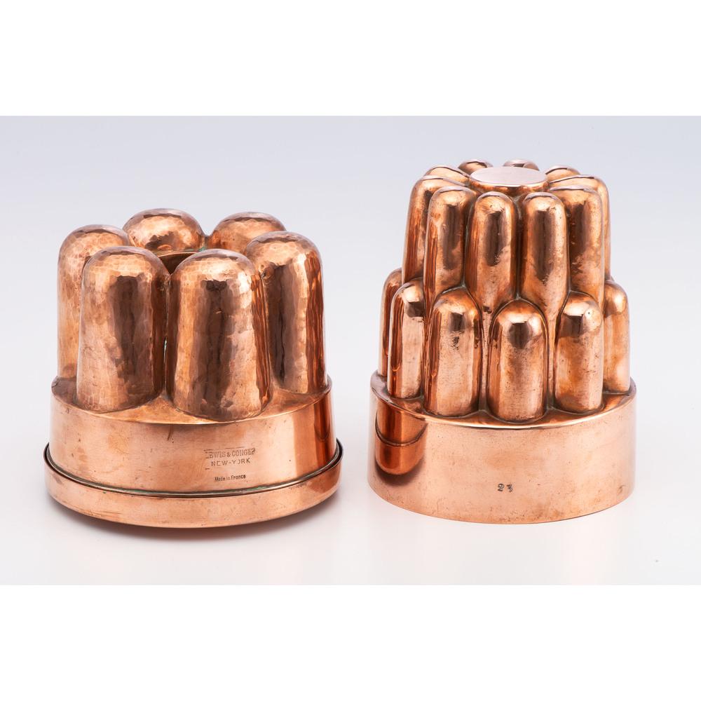 Two Copper Molds, English and French: 19th Century one stamped Lewis & Conger / New York / Made in France on lid and side. the other stamped 23 and initialed S. Height of French mold 5 1/2 x diameter 6 1/2 inches. Height of English mold