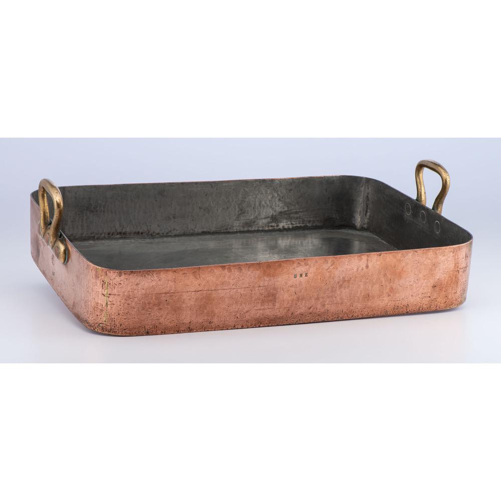 A Large French Copper Roasting Pan: 20th Century stamped Meret France. Height 4 x length 24 x width 16 inches. Provenance: Property from the Collection of Darryl Lippman