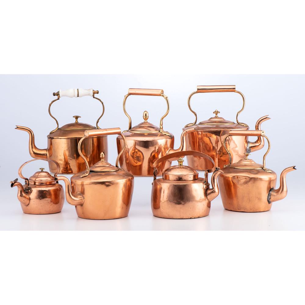 A Group of Copper Kettles: 19th/20th Century includes seven kettles, one with impressed marks CIO ALS and another marked PPF. Height of largest 10 3/4 inches.
