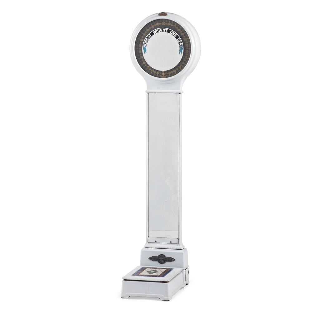 A Peerless Weighing Machine Co. Porcelain and Iron: A Peerless Weighing Machine Co. Porcelain and Iron Mirrored Scale Detroit, Michigan, Circa 1920s serial number 492. Height 70 1/8 inches.
