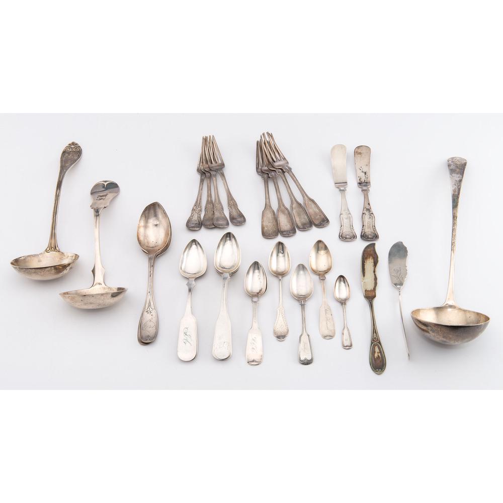 A Group of American Coin Silver Flatware: 19th Century thirty-one pieces in total, all marked. including ladles by T.G. Calvert of Lexington and E. Mead & Co. of St. Louis, and two knives by A.G. Medley of Louisville. Total silver weight 49.7