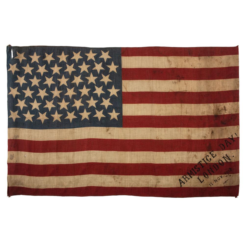 45-Star Armistice Day, London Flag: Printed flag on cotton, 17.5 x 28 in. Handwritten inscription in lower right corner: "Armistice Day! London. 11 Nov. 1918." Ca 1918. At 11:00 a.m. on November 11, 1918, Germany signed a cease-fire agr