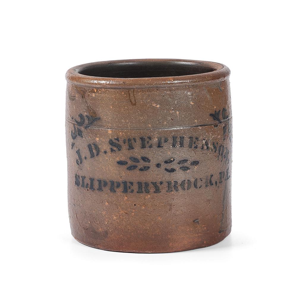 A Scarce Slippery Rock, Pennsylvania One Gallon: A Scarce Slippery Rock, Pennsylvania One Gallon Stoneware Crock J.D. Stephenson, Slippery Rock, Pennsylvania, Third/Fourth Quarter 19th Century straight-sided form with tooling about 2 1/2 inches belo
