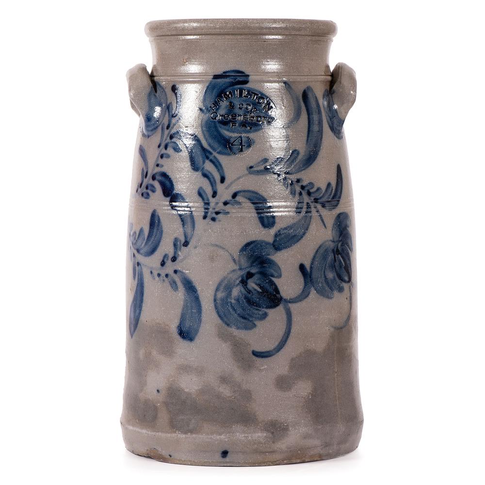 A Four Gallon Cobalt Decorated Stoneware Churn: Hamilton & Co., Greensboro, Pennsylvania, 19th Century of conical form with applied lug handles, tooled neck and body, boldly stamped with the pottery and capacity mark, wth bright cobalt floral deco