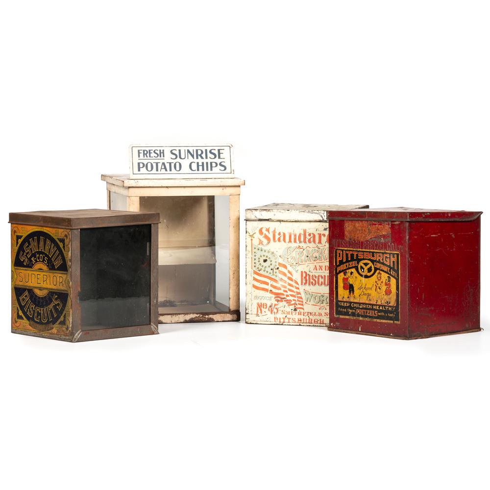 Four Country Store Counter Snack Tins: Early 20th Century including Pittsburgh Pretzel Company, Standard Cracker & Biscuit Works, S.S. Marvin & Co.'s Superior Biscuits, and Sunrise Potato Chips. Height of largest 17 1/2 x width 12 x depth 