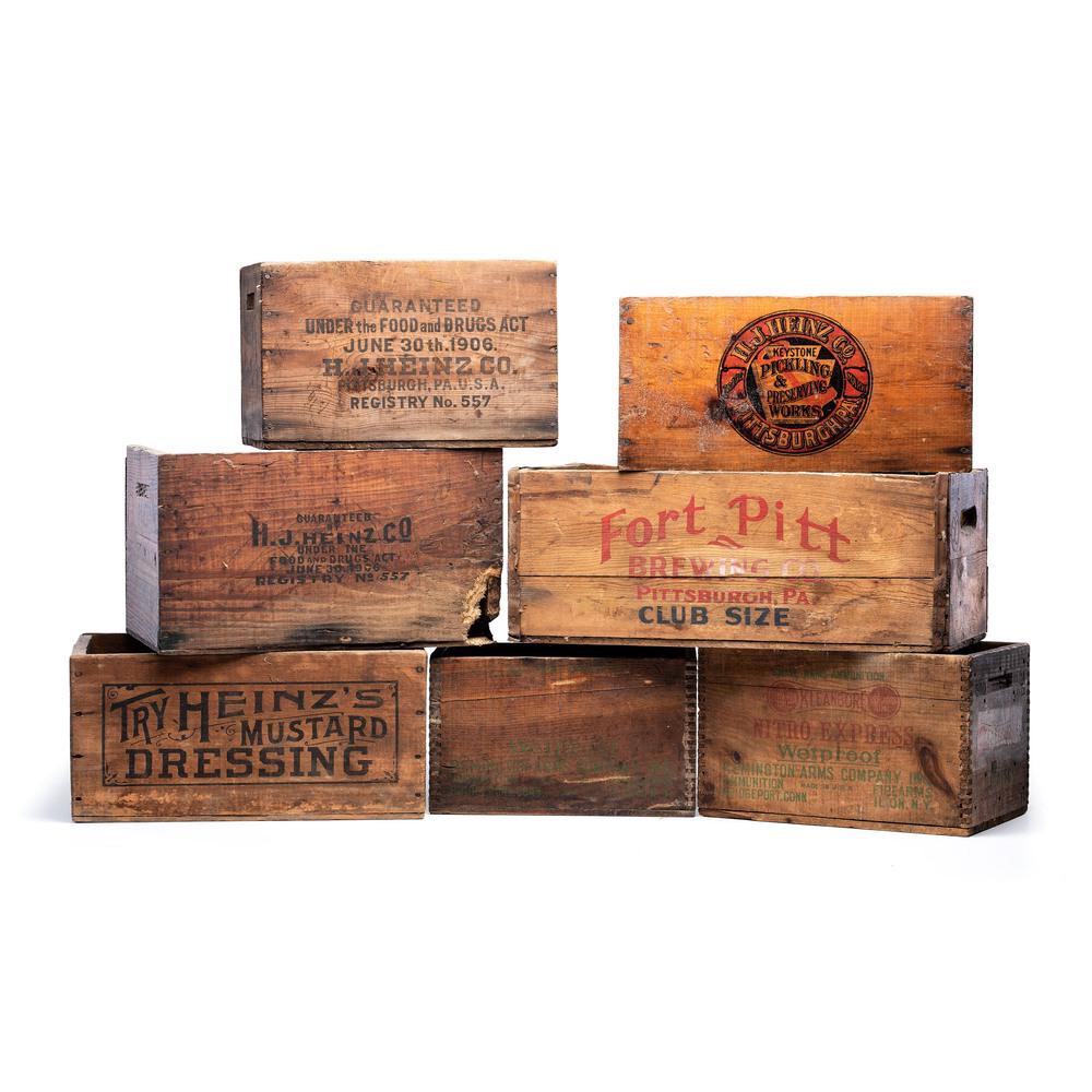 Six Advertising Storage Crates: Late 19th/Early 20th Century for Heinz, Fort Pitt Brewing, and Remington products, and including a Heinz box lid. Height of largest 9 x width 23 x depth 10 1/4 inches.