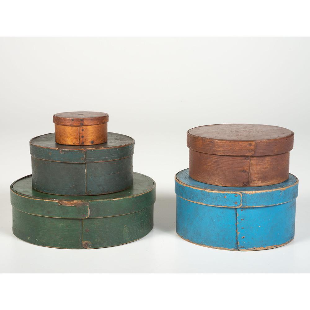 Five Round Pantry Boxes: Five Round Pantry Boxes 19th Century of various sizes, one unpainted, one in red paint, one in blue paint and two in green paint. two with illegible impressions on lids, one with impressed T.P. Johnso