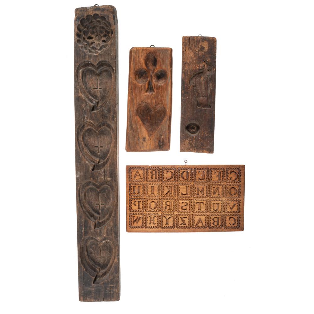 Four Carved Wood Butter or Biscuit Molds: Four Carved Wood Butter or Biscuit Molds Late 18th/19th Century Length of longest 29 inches.