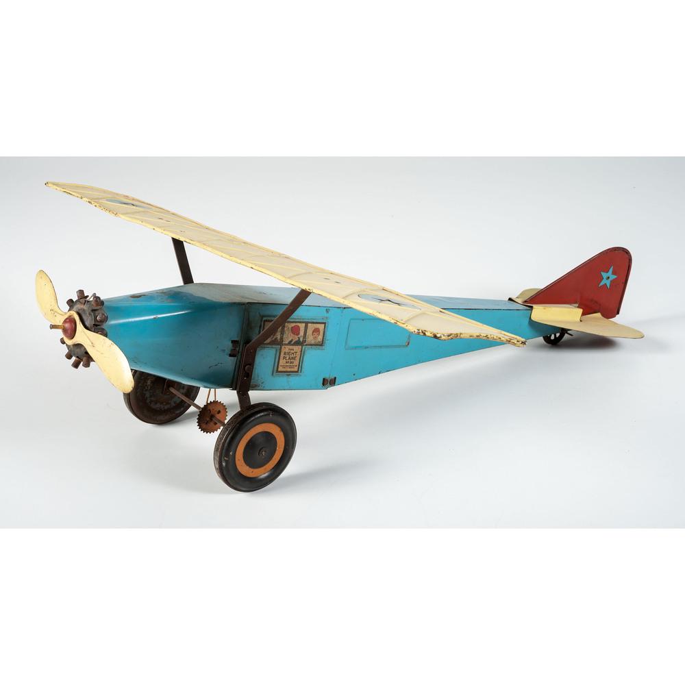 A The Right Plane Tin Toy Plane: A The Right Plane Tin Toy Plane 20th Century Length 29 3/4 inches.
