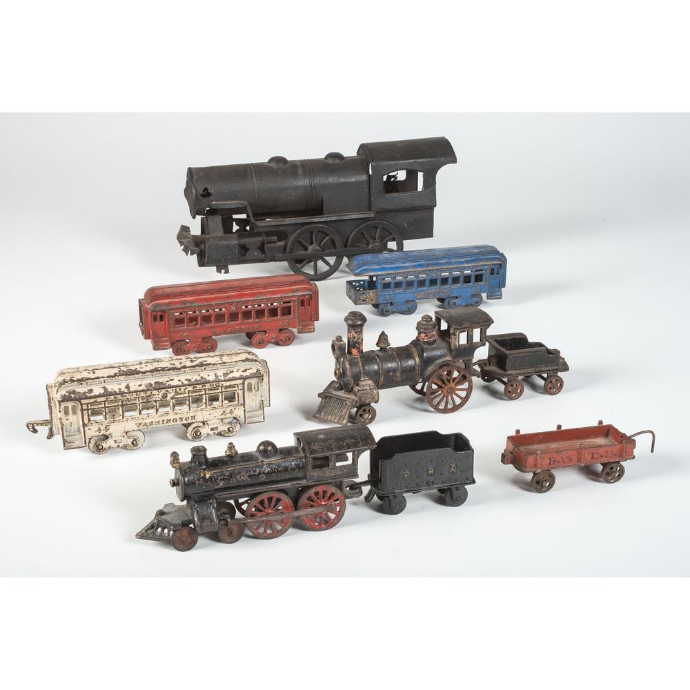 Nine Cast Iron Toy Train Parts: Nine Cast Iron Toy Train Parts 20th Century Largest height 8 1/4 x 17 1/2 inches.