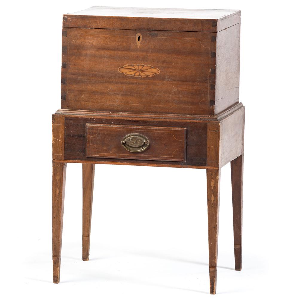 A Federal Inlaid Mahogany Cellarette on Stand: A Federal Inlaid Mahogany Cellarette on Stand Mid-Atlantic States, Circa 1800 Height 33 3/4 x width 21 x depth 17 inches.