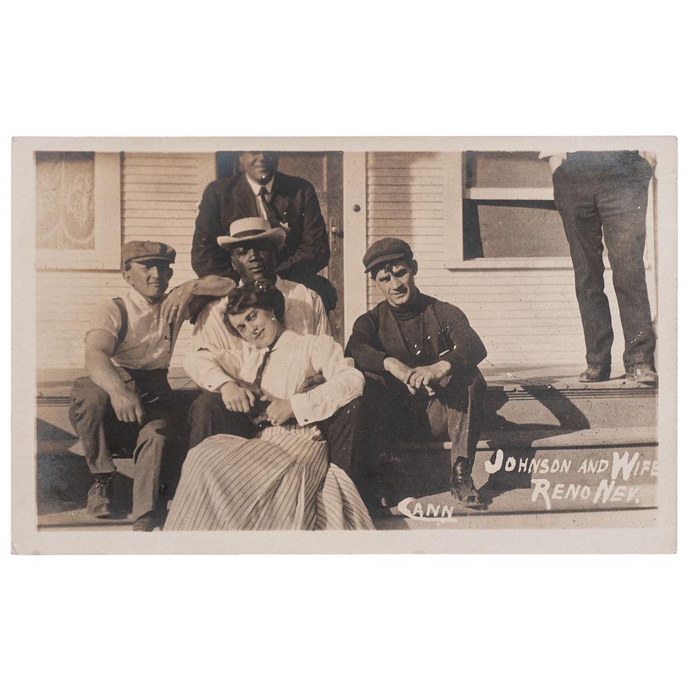 Johnson and Wife Reno Nev., Real Photo Postcard, 1910: Real photo postcard of Jack Johnson with Etta Terry Duryea and trainers. 5.5 x 3.5 in. Postally unused. Captioned in negative: "Johnson and Wife Reno, Nev." alongside photographer's imprint. Cann: [