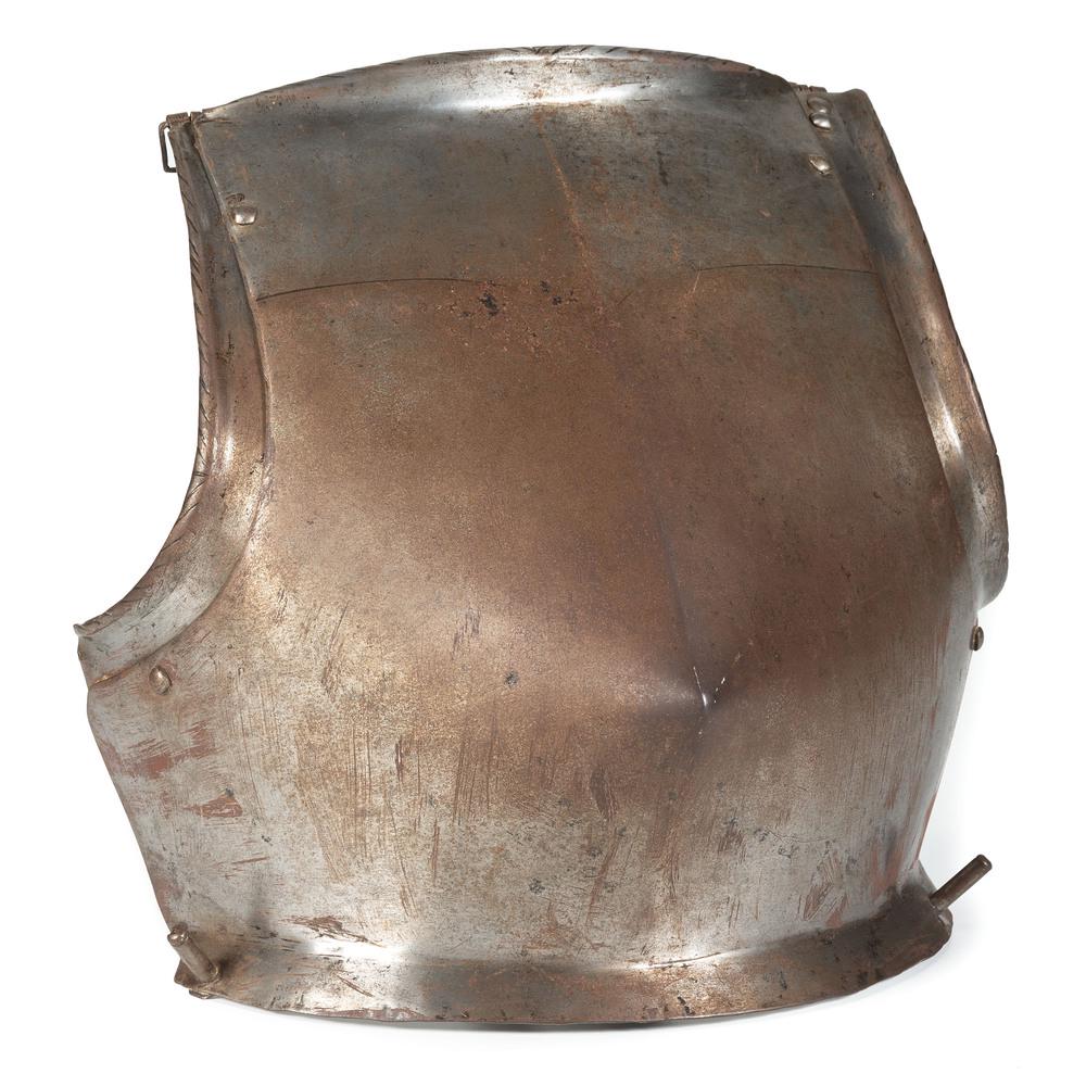 Mid-16th Century German Steel Breastplate: 15" high x 15" wide at its widest point. Top region with two buckles. Top regions and side regions with primitively rendered delineated rolled borders. Reverse side of plate with inked red museum a