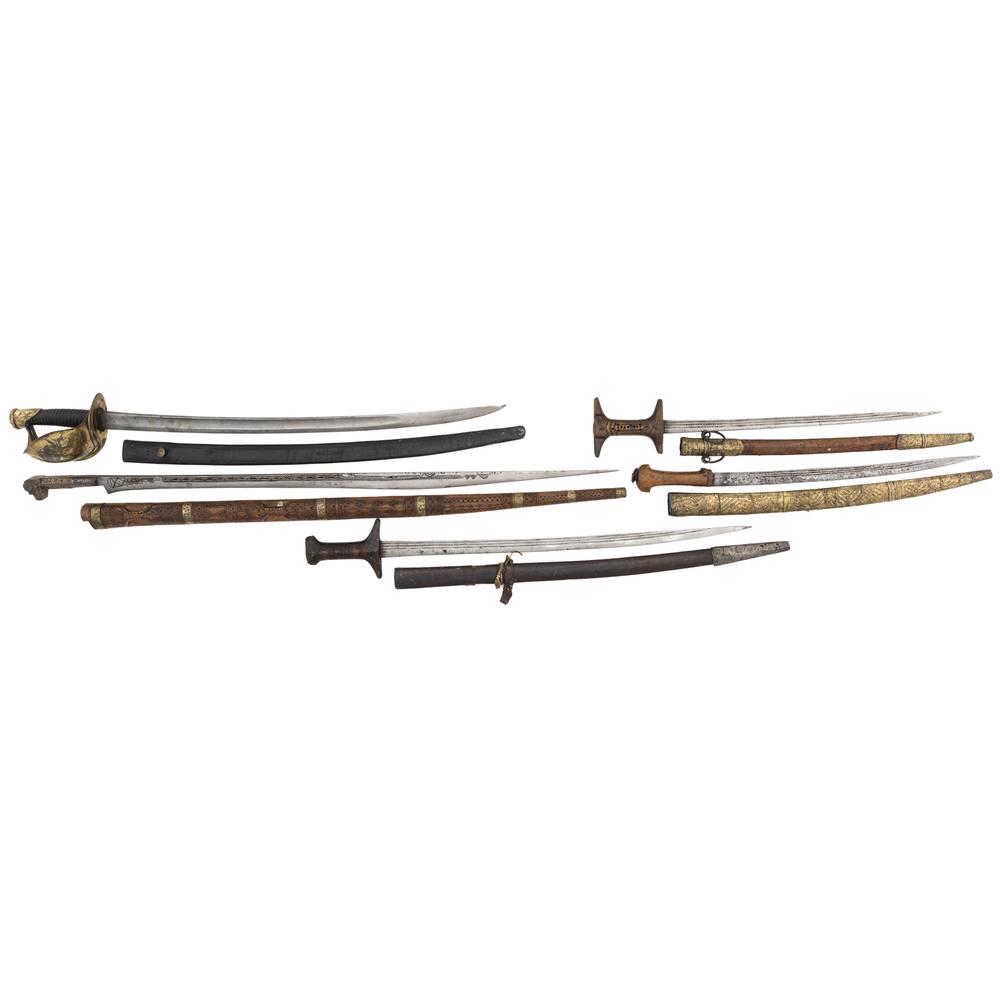 Lot of 15 Swords and Machetes Of Various Regions and: Lot consists of an African sword with a 32" blade on a 5" handle with a 1.5" hilt with a metal sheath an African sword with a 20.5" blade on a 5" wooden handle an African sword with a 17.75" blade on