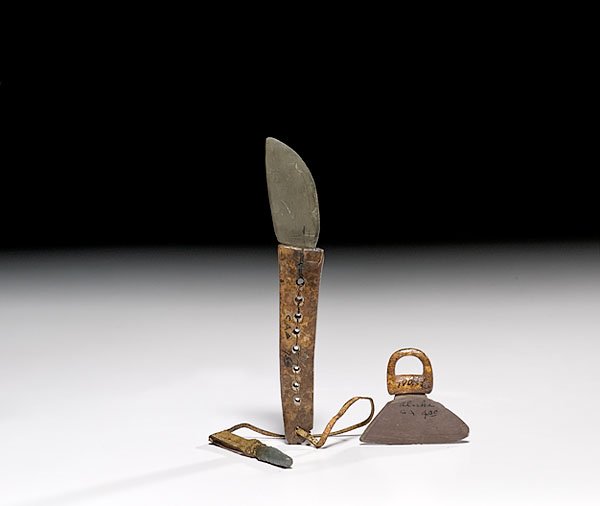 Eskimo Ulu, Knife, and Whetstone, : Eskimo Ulu, Knife, and Whetstone, ca 1900 ulu and knife with fossilized walrus ivory handles and slate blades; whetstone with walrus hide handle, length of ulu 3"; length of knife 8"; length of whet
