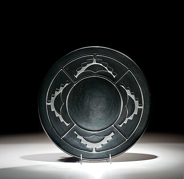 Santa Clara Blackware Plate by Toni Roller, : Santa Clara Blackware Plate by Toni Roller, 1984 carved with hard, stepped devices and soft semi-circles; signed and dated on base, diameter 14.5".