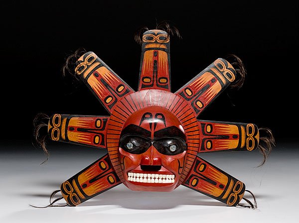 Northwest Coast Hand-Carved and Painted Sun Mask/P: Northwest Coast Hand-Carved and Painted Sun Mask/Plaque, ca 1970-80 with black horsehair, abalone eyes, and bone teeth set in a grinning mouth, height 18" x width 20.75".