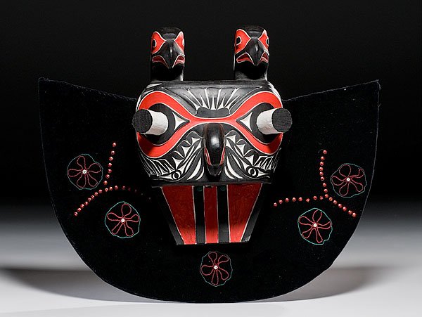 Northwest Coast Hand-Carved and Painted Wooden Mas: Northwest Coast Hand-Carved and Painted Wooden Mask, ca 1970-80 with eagles guarding totemic face that is placed on semi-circular frame covered in black velvet and embellished with red sequins and b