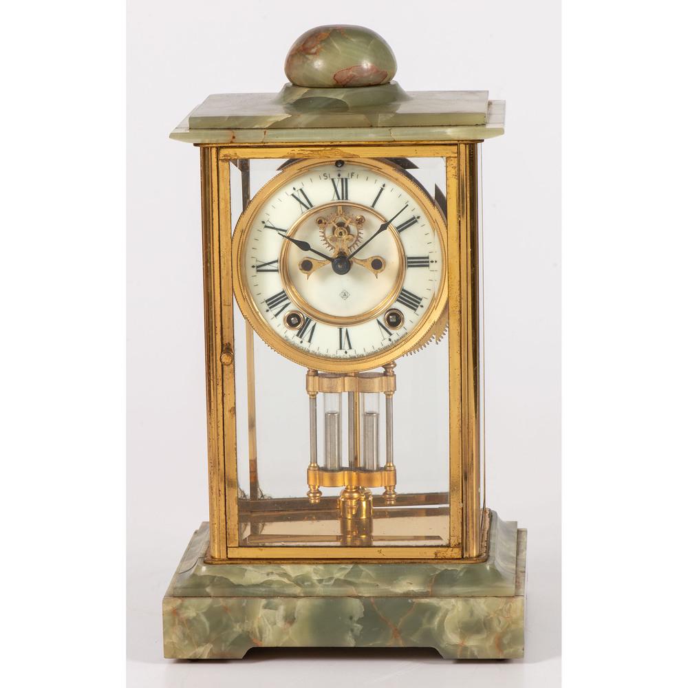 An Ansonia Crystal and Onyx Regulator Clock: American, 20th Century works marked Ansonia / Patented / New York. Height 13 x width 7 1/2 x depth 6 inches.