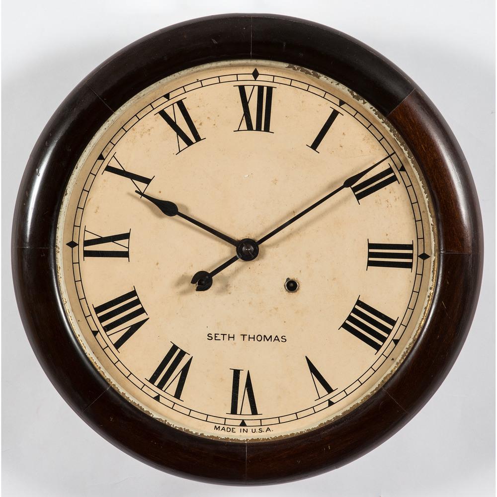 A Seth Thomas Mahogany Gallery Clock: Early 20th Century Diameter 17 inches.