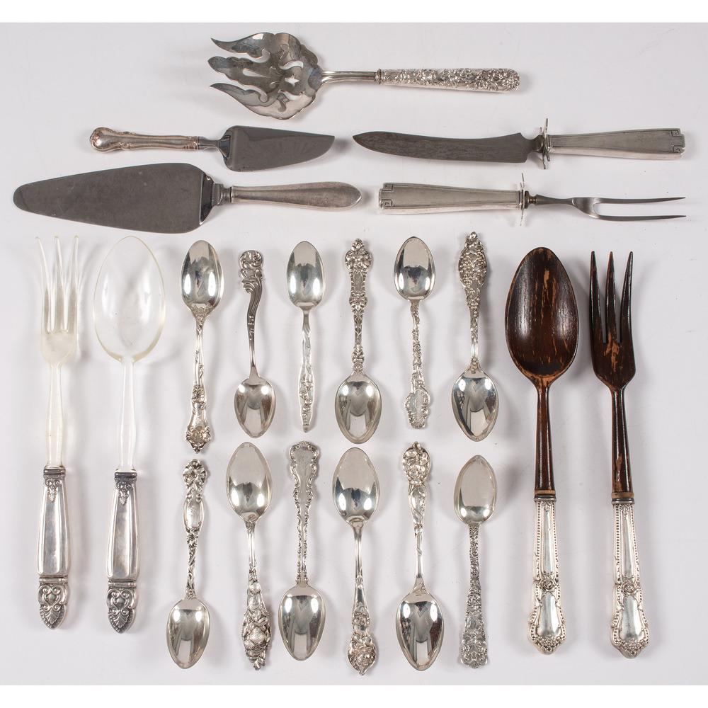 A Group of Sterling Spoons and Serving Utensils: American, 20th Century twenty-one items total including twelve sterling spoons and nine serving pieces with sterling handles, by various makers including Gorham. Length of longest 10 3/4 inches. Sil