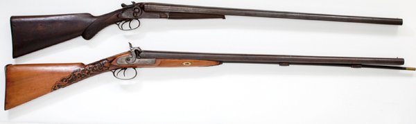 Pair of Double Barrel Shotguns, : Pair of Double Barrel Shotguns, 12 gauge percussion with forward-action locks, 31" double barrels. Wood stock with vine style carving. 12 gauge breech loading hammer gun. 30" barrels, locks marked P