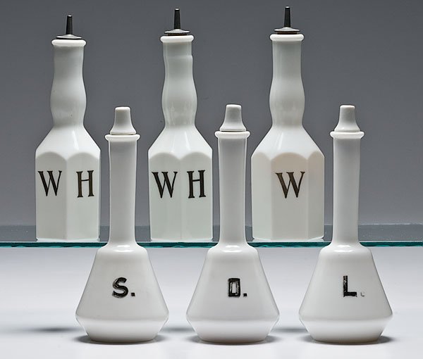 Group of Hand-Painted Milk Glass Barber Bottles, : Group of Hand-Painted Milk Glass Barber Bottles, lot of six. Three have cylindrical bottoms with hand-painted labels reading O., S. and L. with Koken Barber Supply labels on their undersides. The ot