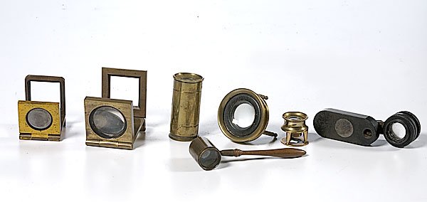 Lot of Table and Pocket Magnifying Glasses, : Lot of Table and Pocket Magnifying Glasses, seven small magnifying glasses, including: one brass magnifying glass on three legs; two square brass folding magnifying glasses; two brass pillar magnify
