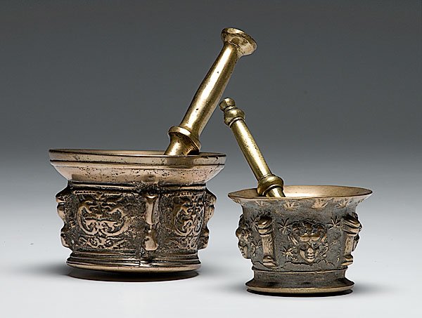 Two Brass Classical Motif Mortars and Pestles, : Two Brass Classical Motif Mortars and Pestles, including one brass mortar and pestle with classic motifs, 3.2" tall x 4.4" diameter. PLUS one brass, possibly Chinese, mortar and pestle, 3.9" tall x 