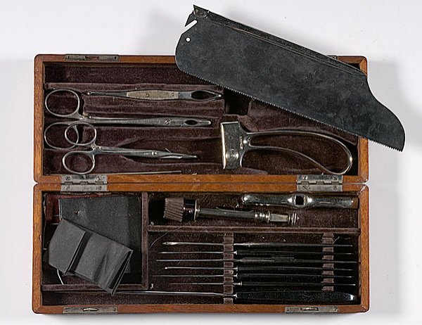Lentz & Sons Amputation Kit, : Lentz & Sons Amputation Kit, early 20th century. Includes original steel amputation saw, amputation knives with Bakelite handles, and steel trephine. The kit is missing a few items and has some adde
